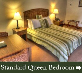 standard-queen-bedroom at the shady lawn lodge
